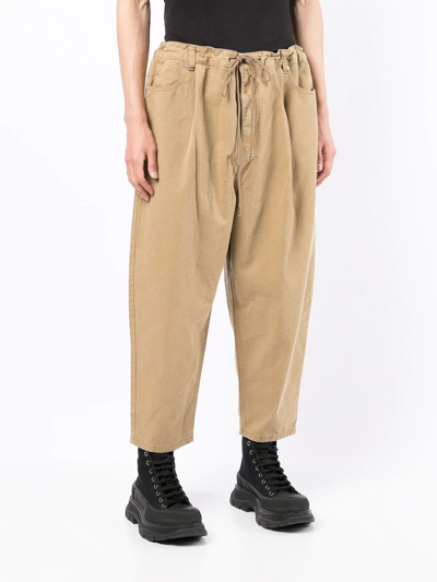 Juunj Cropped Tapered-leg Trousers In Brown