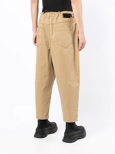 Shop Juunj Cropped Tapered-leg Trousers In Brown