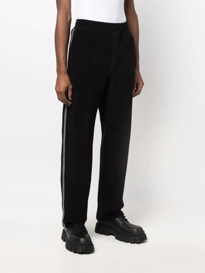 Shop Fendi Side Stripe Detail Trousers In Black