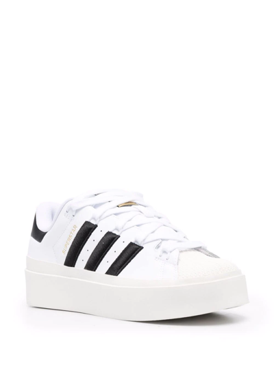 Shop Adidas Originals Superstar Bonega Sneakers In White