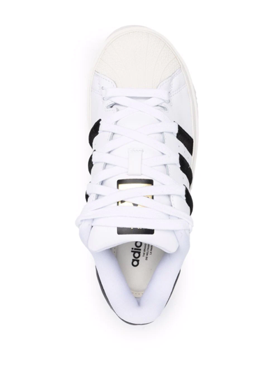 Shop Adidas Originals Superstar Bonega Sneakers In White