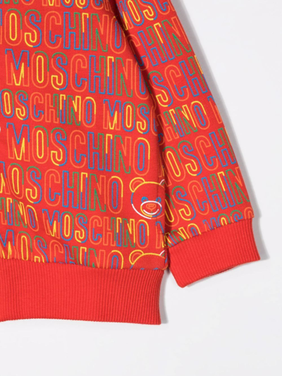 Shop Moschino All-over Logo Print Hoodie In Red