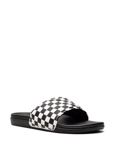 Shop Vans La Costa "checkerboard" Slides In White