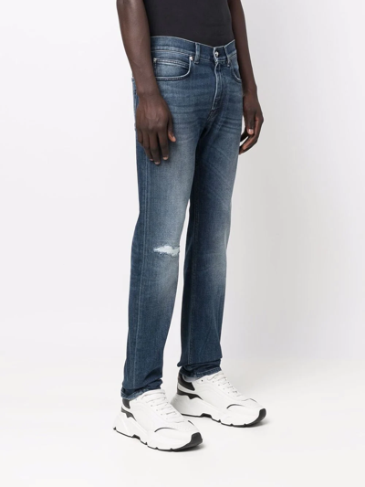 Shop Versace Medusa Plaque Slim-fit Jeans In Blue