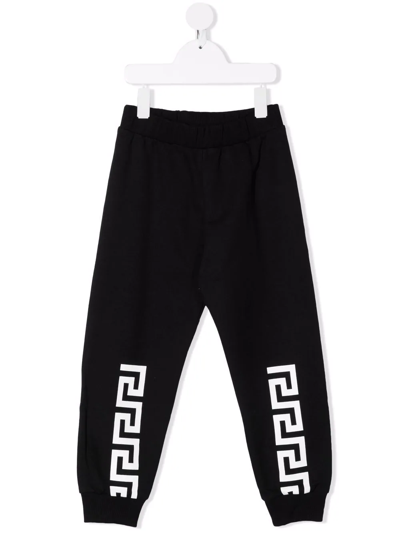 Shop Versace Greca-print Cotton Track Pants In Black