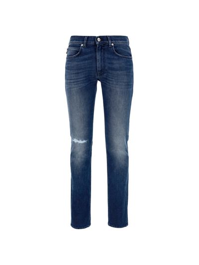 Shop Versace Distressed Slim Fit Jeans In Blue