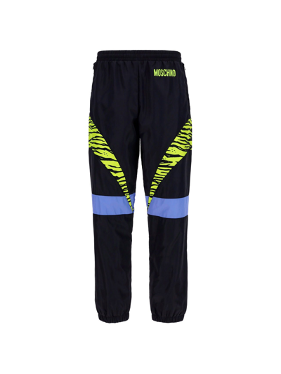 Shop Moschino Logo Printed Jogging Pants In Multi