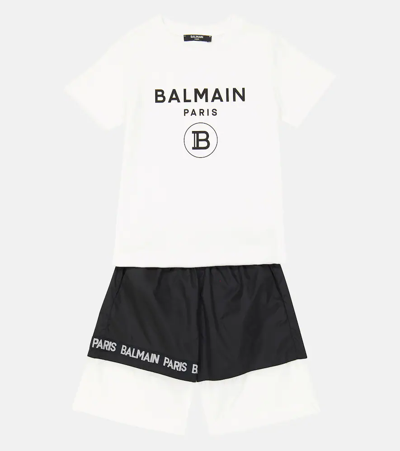 Shop Balmain Logo Printed Colorblock Swim Shorts In 930bc-nero/bianco