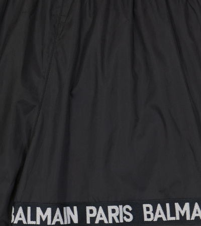 Shop Balmain Logo Printed Colorblock Swim Shorts In 930bc-nero/bianco