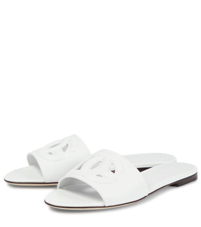 Shop Dolce & Gabbana Logo Cutout Leather Slides In White