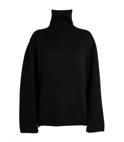 Shop Totême Wool-cashmere Rollneck Sweater In Black