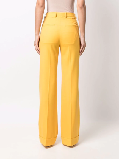 Shop Rochas High-waisted Flared Trousers In Gelb