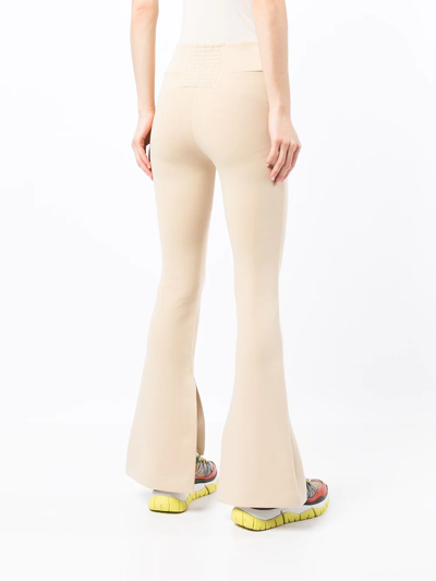 Shop Onefifteen X Beyond The Radar Flared Trousers In Neutrals