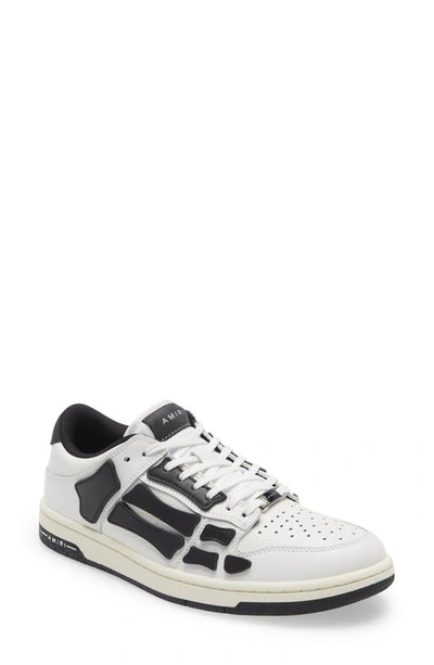 Shop Amiri Skel Top Low Sneaker In White/ Black