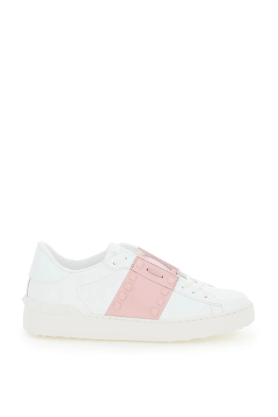 Shop Valentino Rockstud Untitled Sneakers In White,pink