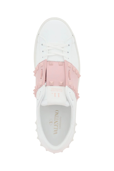 Shop Valentino Rockstud Untitled Sneakers In White,pink