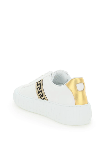 Shop Versace Leather Greca Sneakers In White,gold