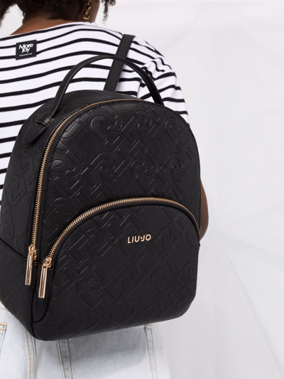 Shop Liu •jo Embossed Logo Backpack In Black
