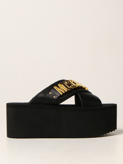 Shop Moschino Running Sandals In Black