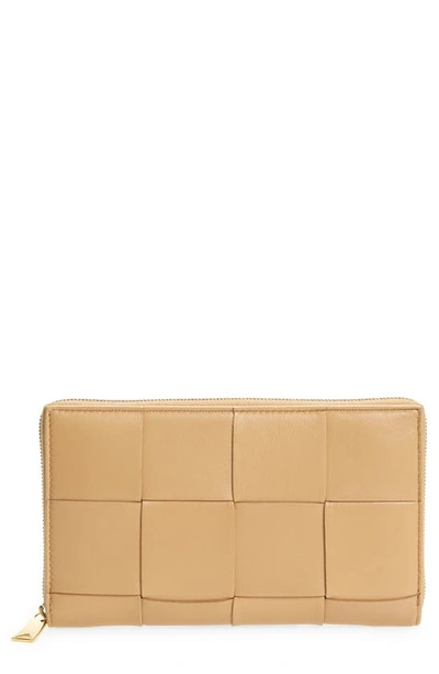 Shop Bottega Veneta Intrecciato Leather Continental Wallet In Almond Gold