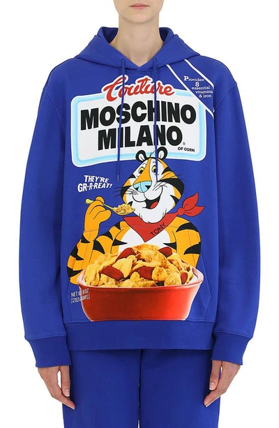 Shop Moschino Tony The Tiger Graphic Hoodie In Fantasy Print Blue