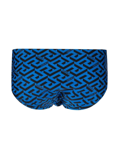 Shop Versace Greca-print Swimming Trunks In Blue