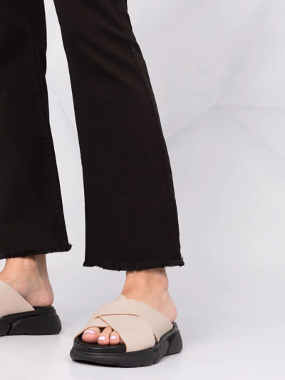 Shop Federica Tosi Flared Raw-cut Hem Trousers In Black