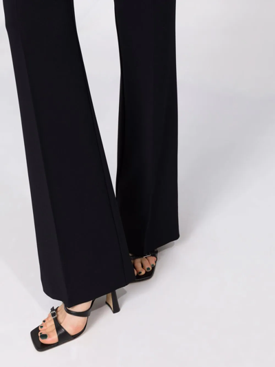 Shop Pinko Flared Tailored Trousers In Black