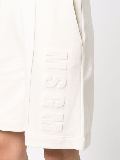 Shop Msgm Embossed Logo Piped-trim Shorts In Nude