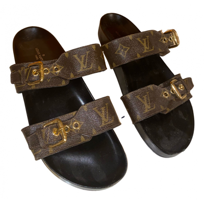Bom dia leather mules Louis Vuitton Brown size 38 EU in Leather