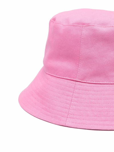 Shop Nanushka Caran Monogram-embroidered Bucket Hat In Pink