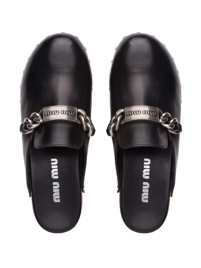 Shop Miu Miu Studded Chain-strap Leather Clogs In Black