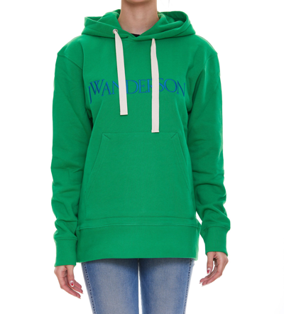 Shop Jw Anderson Logo Embroidered Drawstring Hoodie In Green