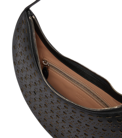Alaïa Half Moon Perforated Leather Shoulder Bag In Noir
