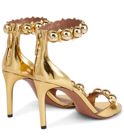 Shop Alaïa Bombe Embellished Leather Sandals In Or