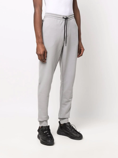 Shop Calvin Klein Logo Tape Track Pants In Grau
