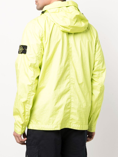 Shop Stone Island Logo Patch Hooded Jacket In Gelb