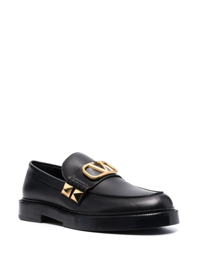 Shop Valentino Stud Sign Leather Loafers In Black