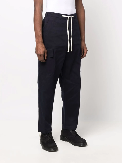 Shop Universal Works Drawstring Straight-leg Trousers In Blue