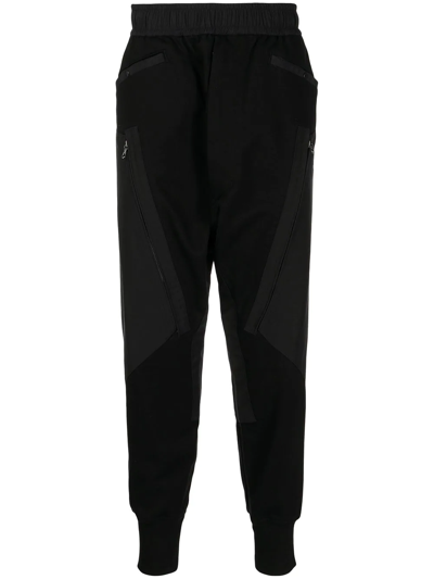 Shop Julius Tapered-leg Track Pants In Black