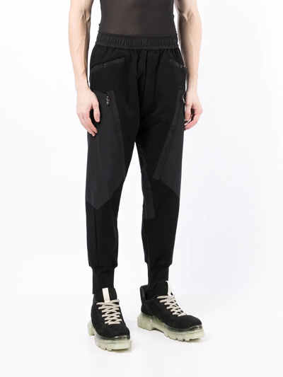 Shop Julius Tapered-leg Track Pants In Black