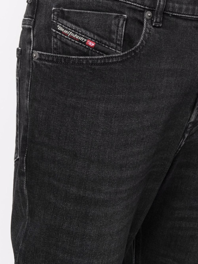 Shop Diesel D-fining Tapered-leg Jeans In Black