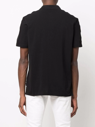 Shop Calvin Klein Logo-print Polo Shirt In Black