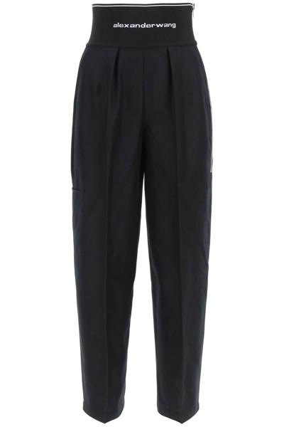 Shop Alexander Wang Carrot Fit Trousers With Logo In Black (black)