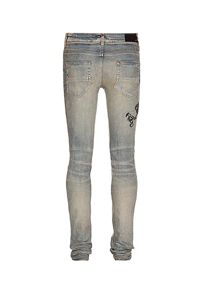 Shop Amiri Old English Logo Jean In Clay Indigo