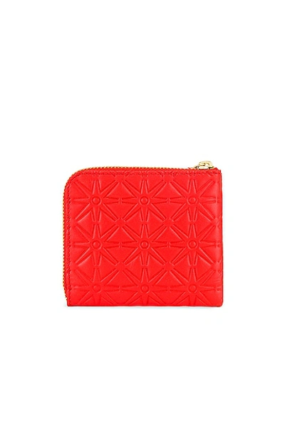 Shop Comme Des Garçons Embossed Zip Wallet In Orange