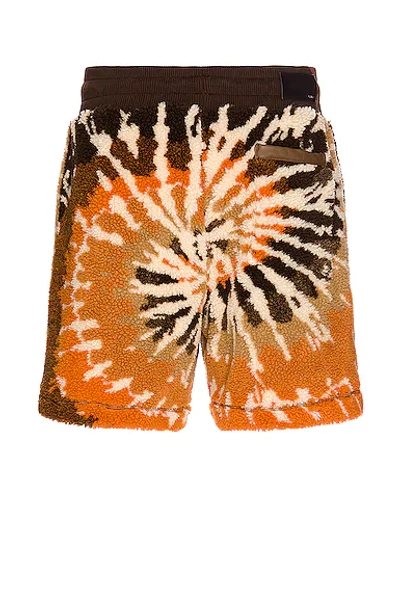 Shop Amiri Tie Dye Polar Fleece Shorts In Orange