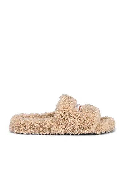 Balenciaga Furry Logo-embroidered Faux Shearling Slides In Beige