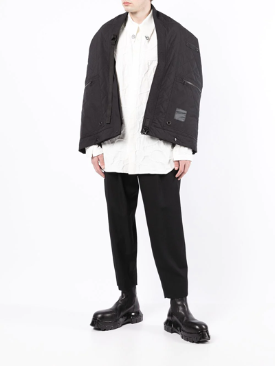 Shop Julius Logo Patch Quilted Cape In Schwarz