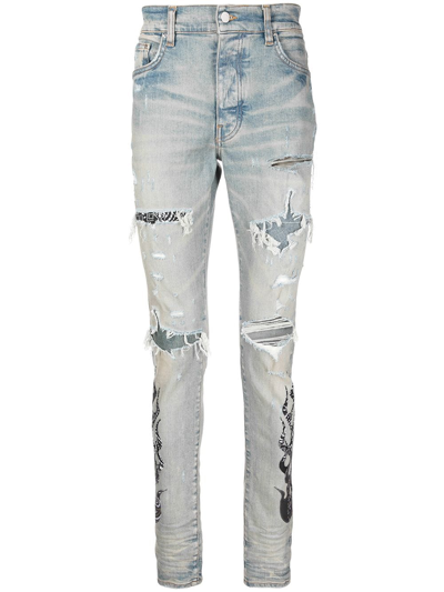 Shop Amiri Paisley-print Ripped Skinny Jeans In Blau
